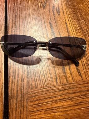 CHANEL Rimless Black Sunglasses with Silver Accents